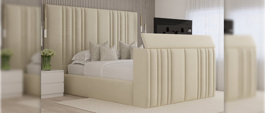 High headboard TV beds with vertical panel detailing and hidden footboard television compartment, upholstered storage bed frame in cream fabric.