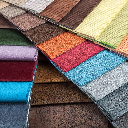 Collection of fabric swatches in various colors and textures.