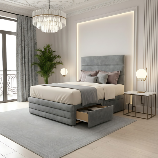 Light grey high headboard divan storage bed with panel design and pull out drawer storage.