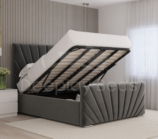 Sunrise Grey Velvet Ottoman Storage Bed with tall tufted panel headboard and elevated mattress to reveal spacious storage beneath.