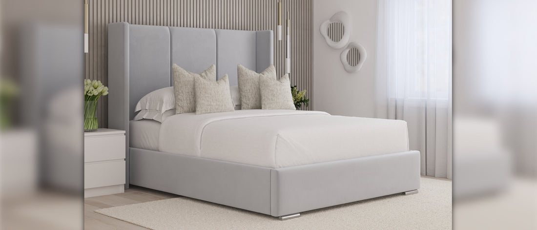 Ottoman storage beds in soft grey upholstered finish with padded headboard, styled in a modern bedroom with neutral décor and natural light