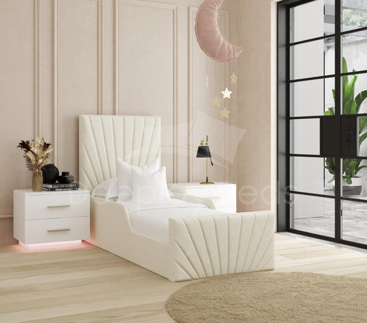 Modern bedroom with a white upholstered bed and matching nightstands.