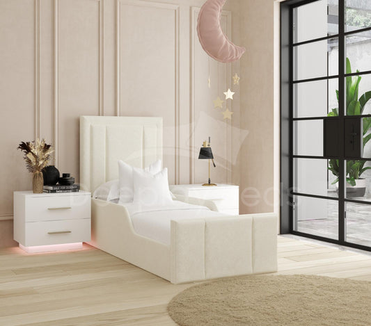Modern bedroom with a white bed, nightstands, and decorative elements.