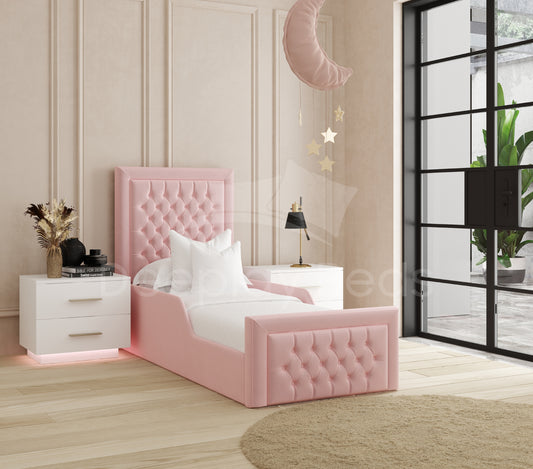 Pink tufted bed in a stylish bedroom with decorative elements.
