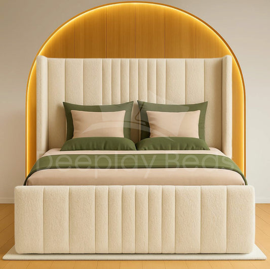 Beige upholstered bed with green accents against a neutral wall