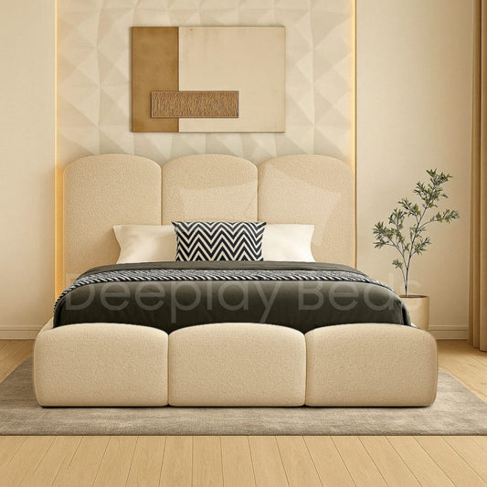 Beige upholstered bed with decorative pillows in a bedroom setting.