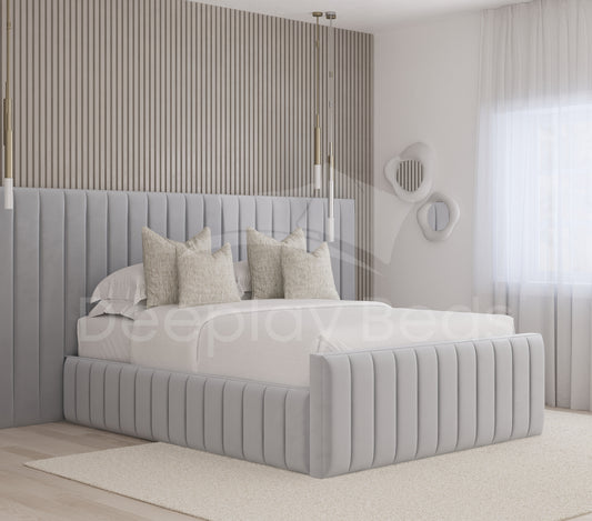 Portsmouth high headboard ottoman storage bed frame in silver, featuring a luxurious lined design and spacious under-bed storage for a modern bedroom.