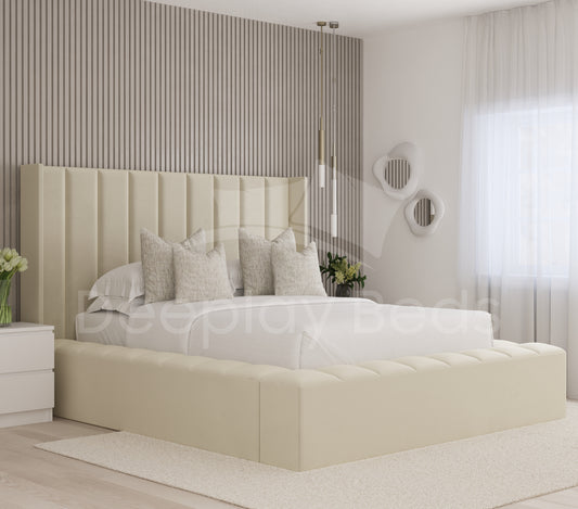 Beige upholstered bed in a modern bedroom with striped wall and decorative elements.