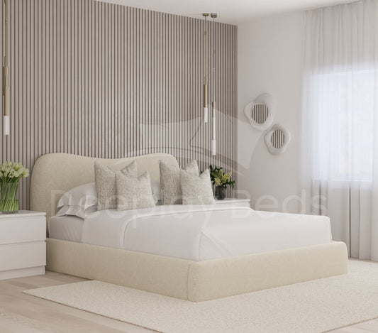Modern bedroom with a beige bed and striped wall.