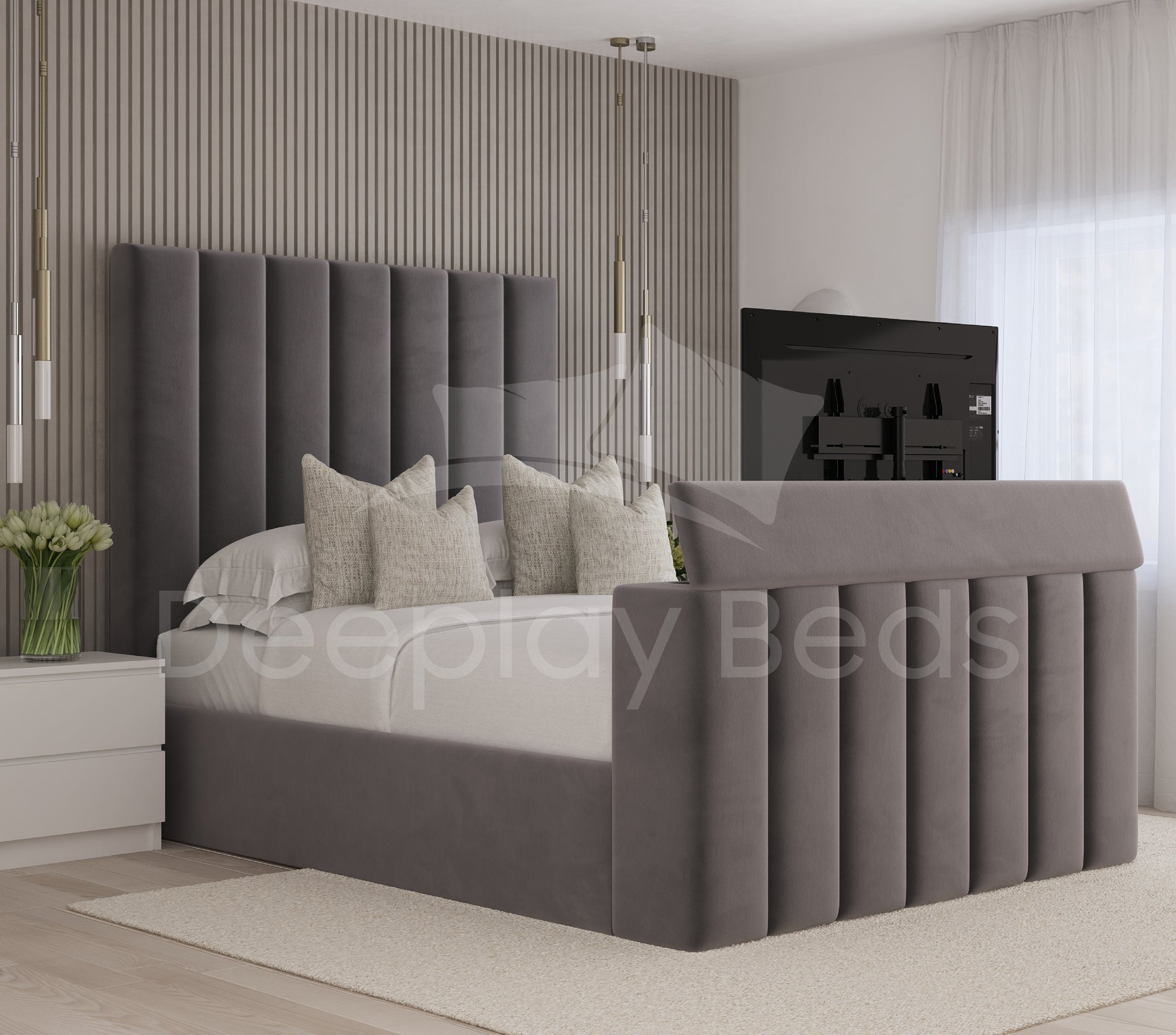 Goldsmiths upholstered TV bed with ottoman storage and high panel headboard in modern bedroom.